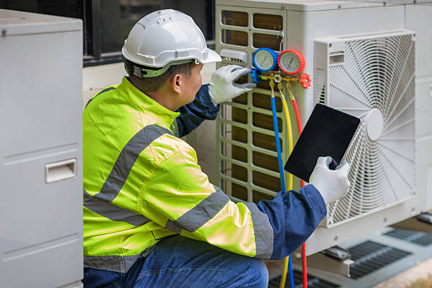 Professional Heat Pump Repair technician working in Logan, IA